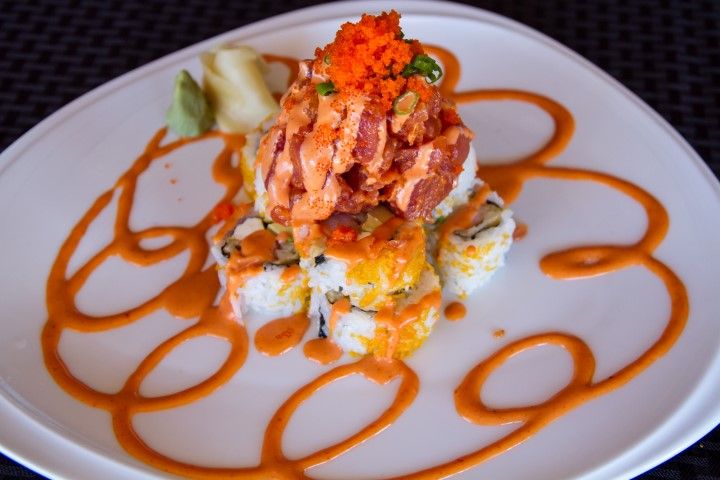 Crazy Tuna roll stacked with spicy tuna and masago